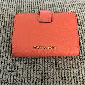 Orange Michael Kors wallet